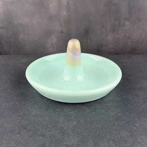 Handmade ceramic ring holder featuring flowing glaze and natural color variation, pottery jewelry holder with glossy surface and unique finish. Pictured here is sea glass gloss option.