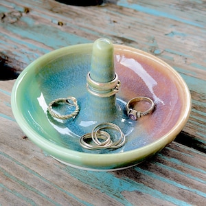 Handmade ceramic ring holder featuring flowing glaze and natural color variation, pottery jewelry holder with glossy surface and unique finish. Pictured here Ocean Sunset glaze option.