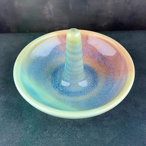 Handmade ceramic ring holder featuring flowing glaze and natural color variation, pottery jewelry holder with glossy surface and unique finish. Pictured here Ocean Sunset glaze option.