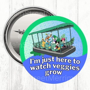 May include: A round button featuring a cartoon boat with Mickey Mouse, Minnie Mouse, Donald Duck, Daisy Duck, Goofy, and Pluto. The button has the text "I'm just here to watch veggies grow" in white on a blue background.