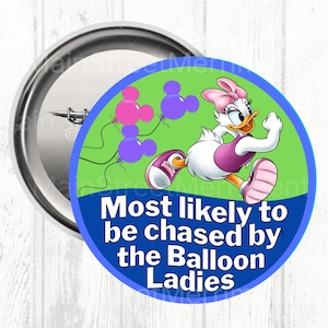 May include: A circular button badge with a cartoon Daisy Duck illustration in a pink and white outfit, running. The badge has a green background with purple and pink balloon clusters. Text reads "Most likely to be chased by the Balloon Ladies."