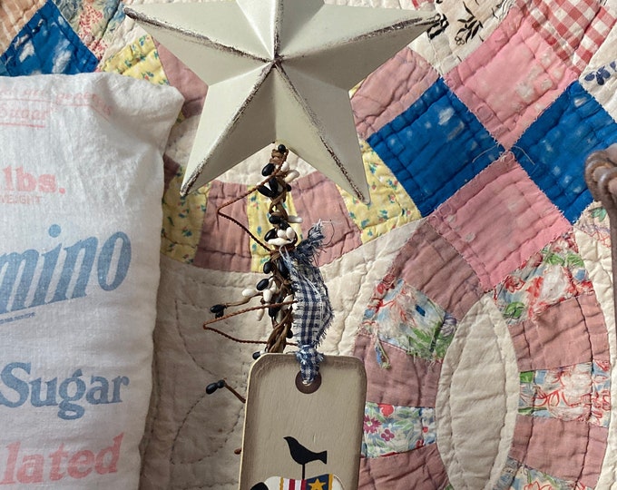 Primitive Style Rustic Meta Star Adorned with Rusty Metal Wire, Pip Berries, and a Sheep Tag