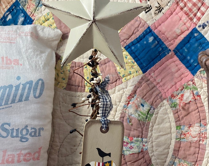 Primitive Style Rustic Meta Star Adorned with Rusty Metal Wire, Pip Berries, and a Sheep Tag