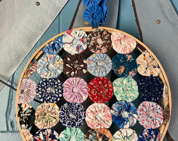 Vintage Embroidery Hoop Showcasing Vintage Yo-Yo Quilt Circles Hanging
