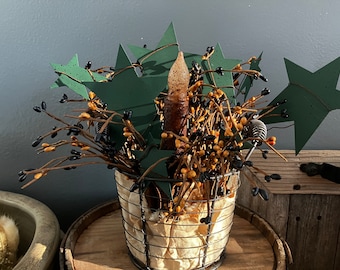 Primitive Style Tabletop Decor with Stars, Pip Berry Branches, and Grungy Battery-Operated Candle