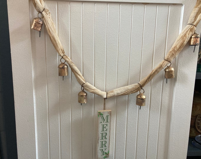 Coffee-Stained Cheesecloth Garland with Rusty Bells and Wooden “Merry” Sign