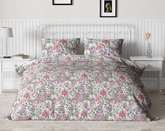 Victorian bedding, cotton duvet cover, and elegant floral arrangement with vintage pattern stamps transform this into a modern home bedding.