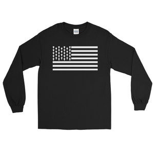 May include: Black long-sleeve t-shirt with a white American flag design made of small, white, upside-down,  teardrop shapes.