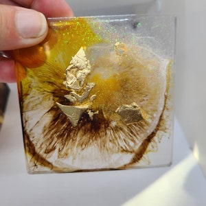 Five piece coaster set/gold flake, yellow and brown