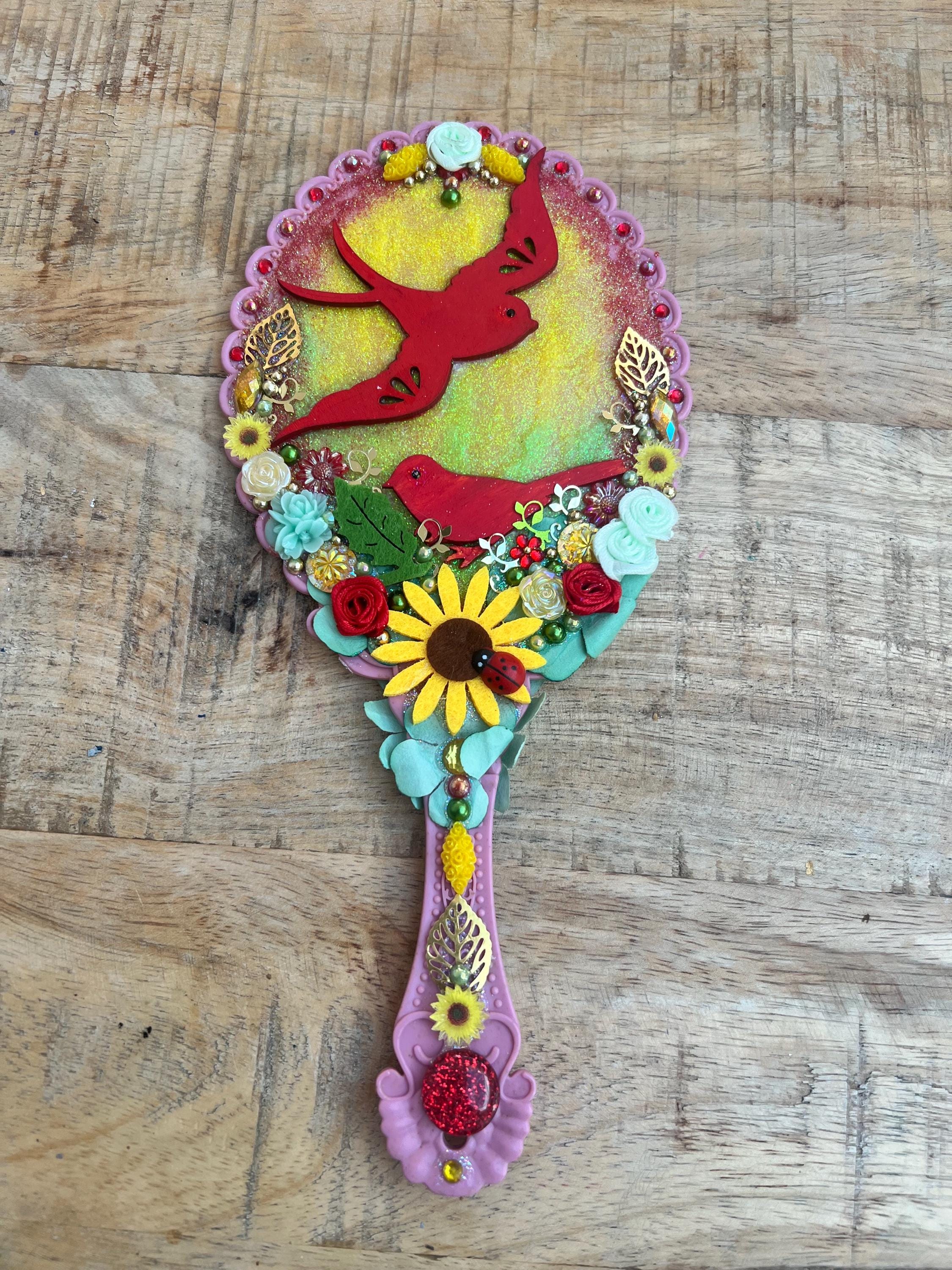 Hand Crafted Pink Floral Hummingbird Hand Mirror with Green Gems il_fullxfull.6743673990_khac.jpg main image 2