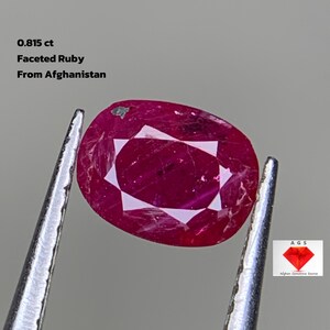 Crimson Clarity: 0.815ct Natural Afghan Oval Ruby