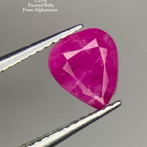 1.23ct Afghan Ruby: A Stunning Faceted Pear-Shaped Gemstone