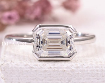 Emerald Cut Moissanite Engagement Ring: Half Bezel Sterling Silver Solitaire