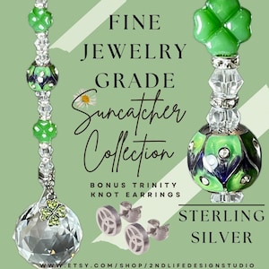 May include: Fine jewelry grade suncatcher collection. The image features a suncatcher with a green clover charm and a clear crystal ball. Also shown are bonus trinity knot earrings. The text says "Sterling Silver".