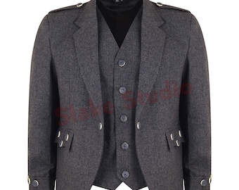 May include: A dark gray tweed jacket with a matching vest. The jacket has gold buttons and a single breasted closure. The vest has a five button closure.