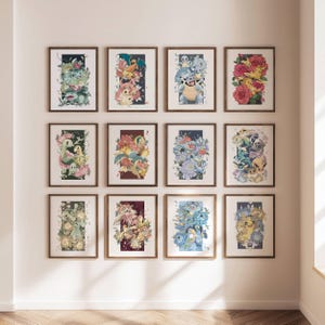 May include: A grid of twelve rectangular wall art prints featuring various illustrated creatures surrounded by detailed floral arrangements. Each print displays a unique colour palette and distinct character designs framed in dark wood.