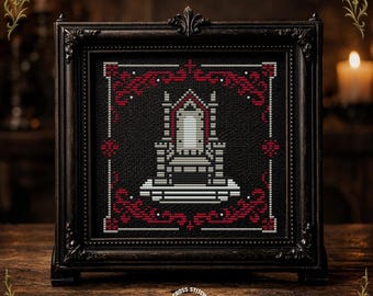 Pode incluir: Arte de ponto cruz emoldurada com um design de trono gótico em preto, vermelho e branco. A obra de arte está sobre um fundo preto e emoldurada em uma moldura escura e ornamentada. O texto "CROSS STITCH PATTERN" está na parte inferior.