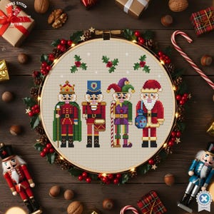 May include: Cross-stitch pattern featuring four Christmas nutcrackers in festive attire. The design includes a king, a soldier, a jester, and Santa Claus, all in a cross-stitch style. The text "CROSS STITCH PATTERN" is visible in the upper left corner.