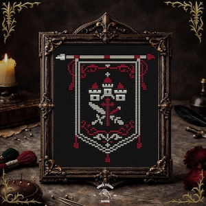 May include: Cross-stitch pattern of a heraldic design in a dark ornate frame. The design features a red and white emblem on a black background. The frame is dark brown with decorative flourishes. The words "Cross Stitch Pattern" are at the bottom.