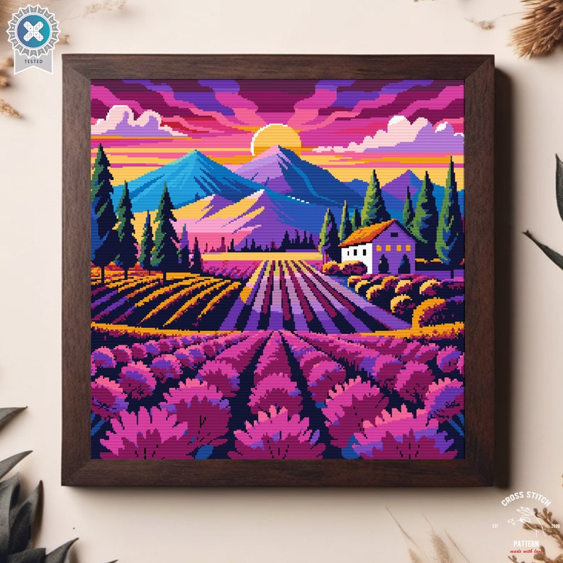 May include: A cross stitch pattern featuring a colorful landscape with a small white house, purple lavender fields, and a sunset sky.