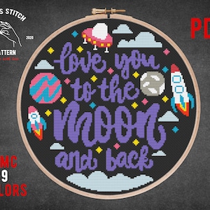 May include: A cross stitch pattern featuring a black background with the text "love you to the moon and back" in purple. The design also includes a rocket, a UFO, and planets in various colors.