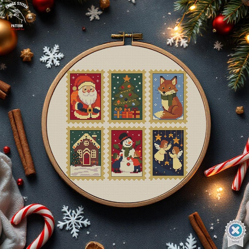 May include: A cross-stitch embroidery hoop featuring six Christmas-themed postage stamp designs. The stamps depict Santa Claus, a Christmas tree, a fox, a gingerbread house, a snowman, and angels. The hoop is set against a dark background with festive decorations.