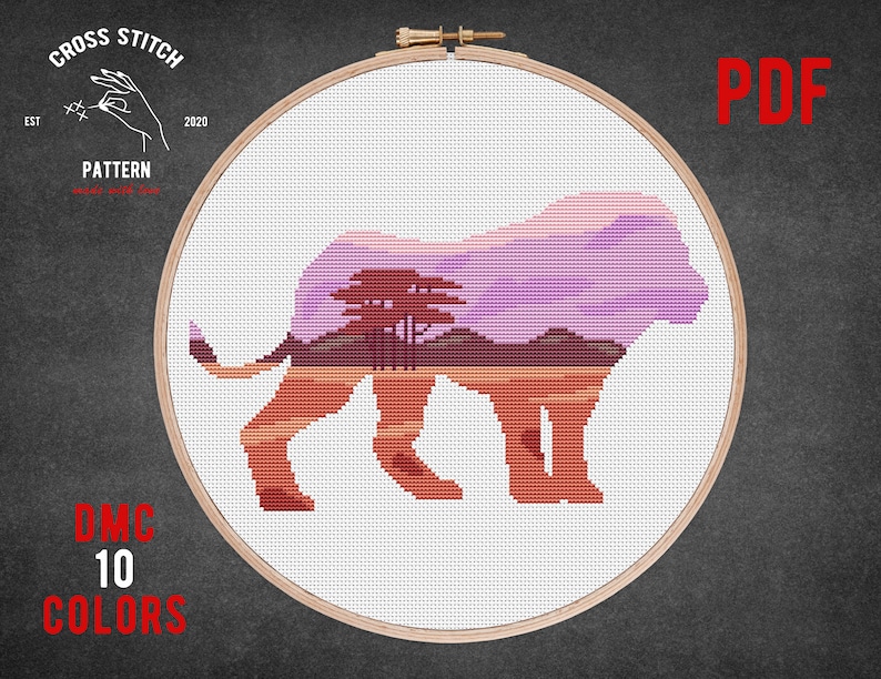 May include: Cross stitch pattern of a lion with a sunset landscape inside its silhouette. The pattern uses 10 colors and is available as a PDF download.