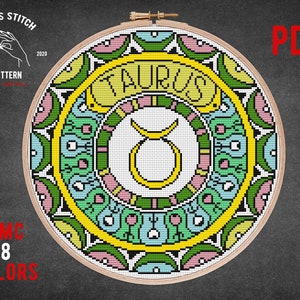 Peut inclure: Patron de point de croix pour le signe du zodiaque Taureau. Le motif repr&eacute;sente un symbole de Taureau jaune entour&eacute; d'un motif de mandala color&eacute;. Le motif est pour 8 couleurs et est disponible en t&eacute;l&eacute;chargement PDF.