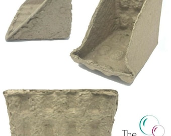 May include: Three brown cardboard corner protectors, made from recycled paper, for packaging and shipping. The protectors are in different positions, showing the inside and outside of the product.
