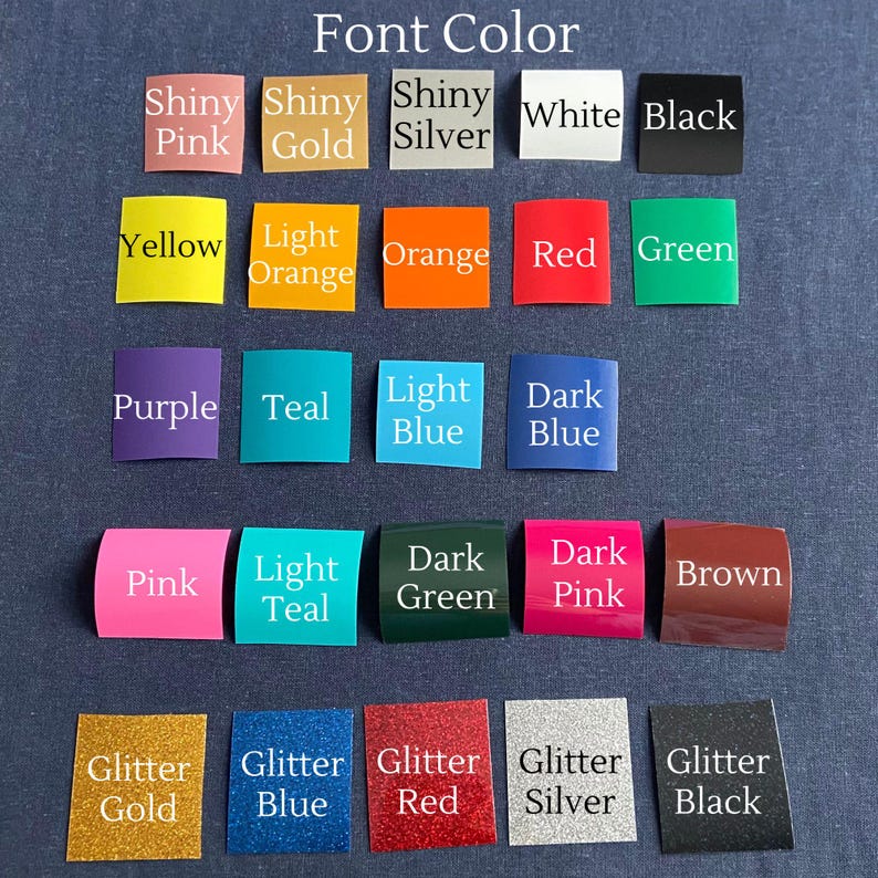 May include: A chart showing 20 different color options for font colors. The colors include shiny pink, shiny gold, shiny silver, white, black, yellow, light orange, orange, red, green, purple, teal, light blue, dark blue, pink, light teal, dark green, dark pink, brown, glitter gold, glitter blue, glitter red, glitter silver, and glitter black.