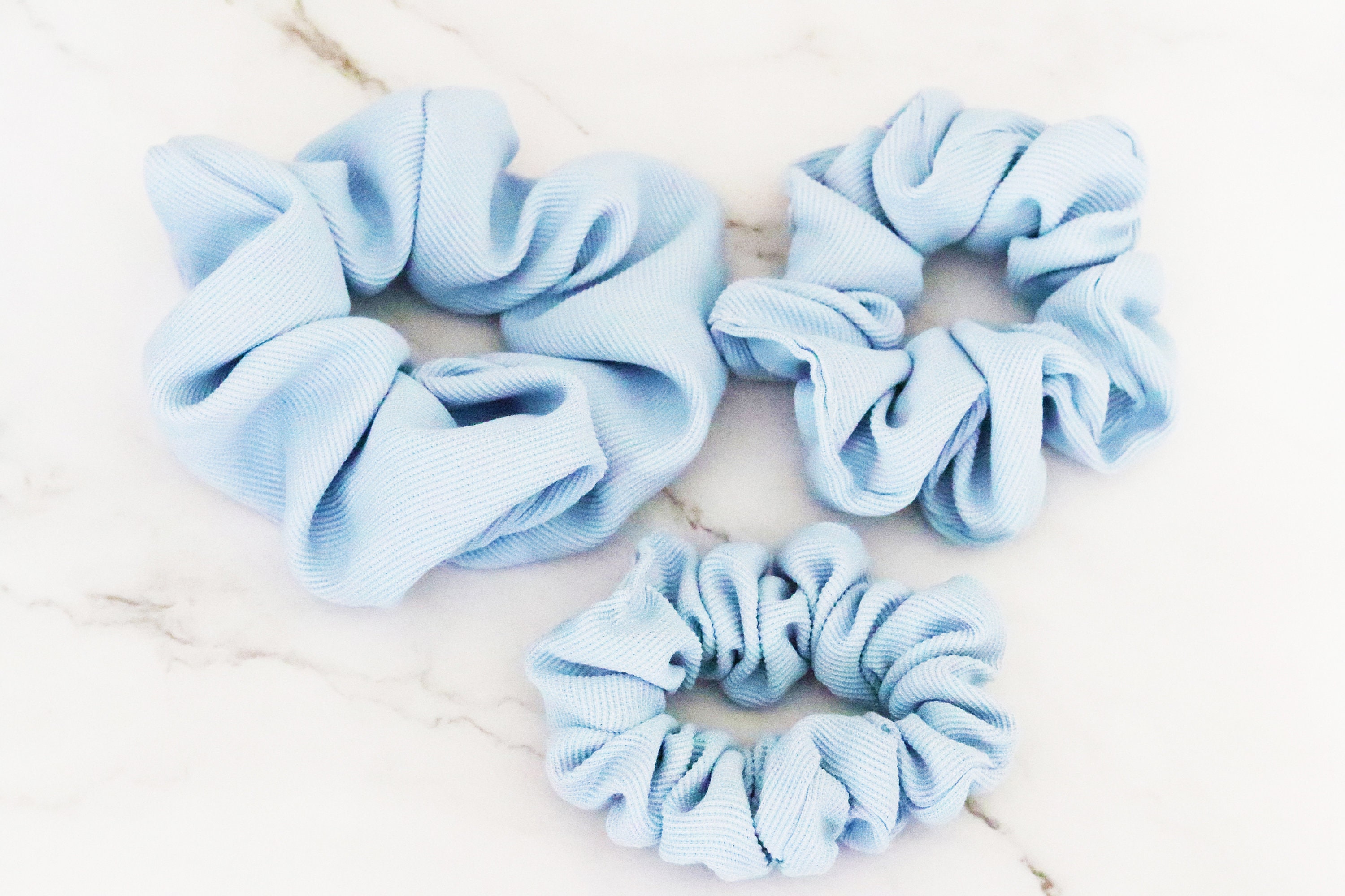 light blue scrunchies