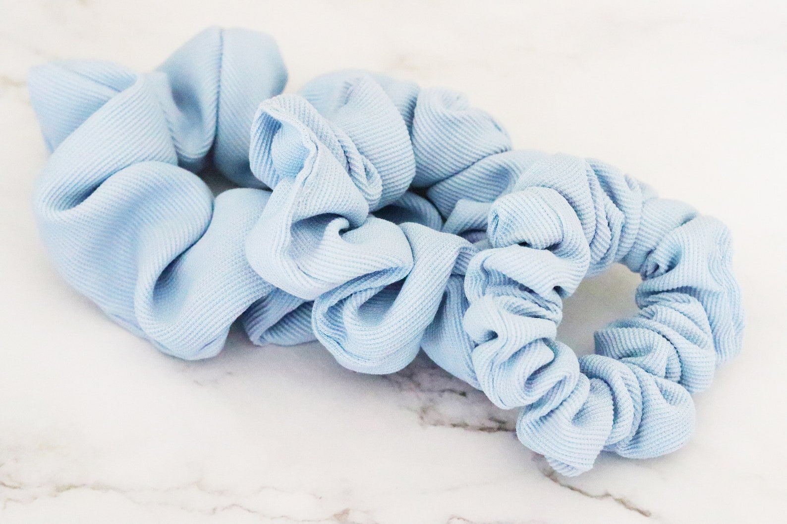 light blue scrunchies