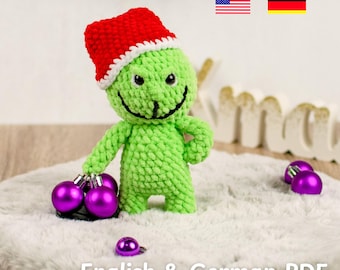 Modèle de monstre au crochet – Amigurumi vert avec bonnet de Père Noël