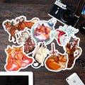 Festive vinyl stickers - original art by Martith Art - Halloween | Christmas | Thanksgiving product logo