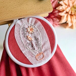 Example of adventure stick and stitch designs in use. Hot air balloon patch with floral petal and leaf details. Soft pastel colours. Just stick on and start embroidering straight away. Perfect summer and Spring project. Make memories and stitch them