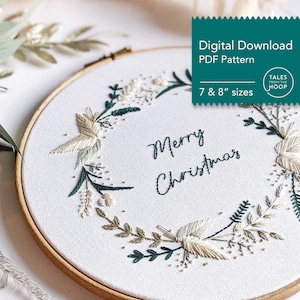 Merry Christmas Wreath Hand Embroidery Pattern Digital Download PDF by Tales from the Hoop. A beautiful festive design with winter florals berries and flowers in understated soft modern colours with metallic gold accents. Christmas handmade wall art.