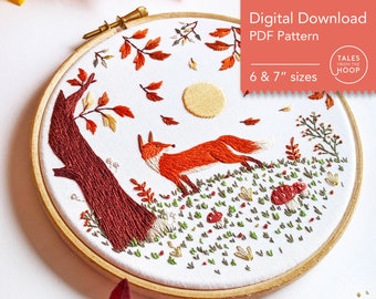 May include: Embroidered hoop art featuring a fox walking through a forest scene with a full moon, falling leaves, and mushrooms. The hoop is 6 or 7 inches in diameter. The text "Tales from the Hoop" is in the upper right corner.