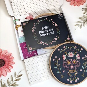 Day of the Dead (Dias es los muertos) embroidery kit by Tales from the Hoop. Create your own stunning floral sugar skull (calavera) with this complete hand embroidery craft kit by Tales from the hoop. A perfect gift for the spooky season.