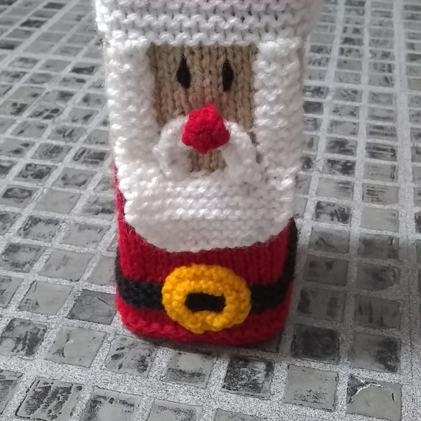 Hand knitted jaffa cake (santa) cover