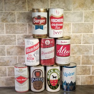 Nine Vintage Beer Cans