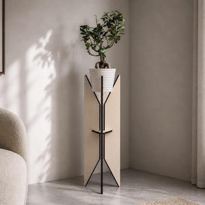 May include: A contemporary plant stand with a cream geometric design. It holds a white planter with a small bonsai tree with green leaves. The stand is approximately 122 cm tall.