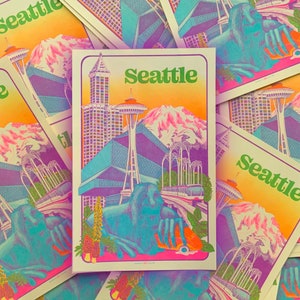 Dreamy Seattle Riso Print featuring the Fremont troll, smith tower, monorail, and Mt Rainier