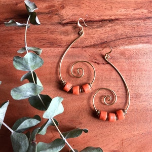 Sankofa // swirl hoop with beads