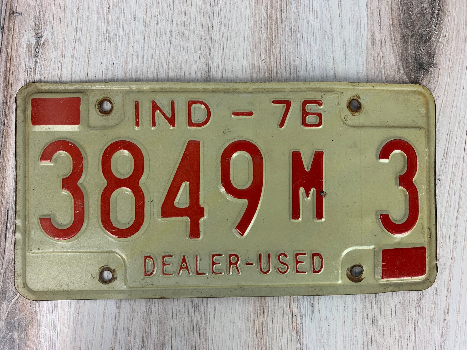 INDIANA 1976 Dealer Used Car License Plate Very Good