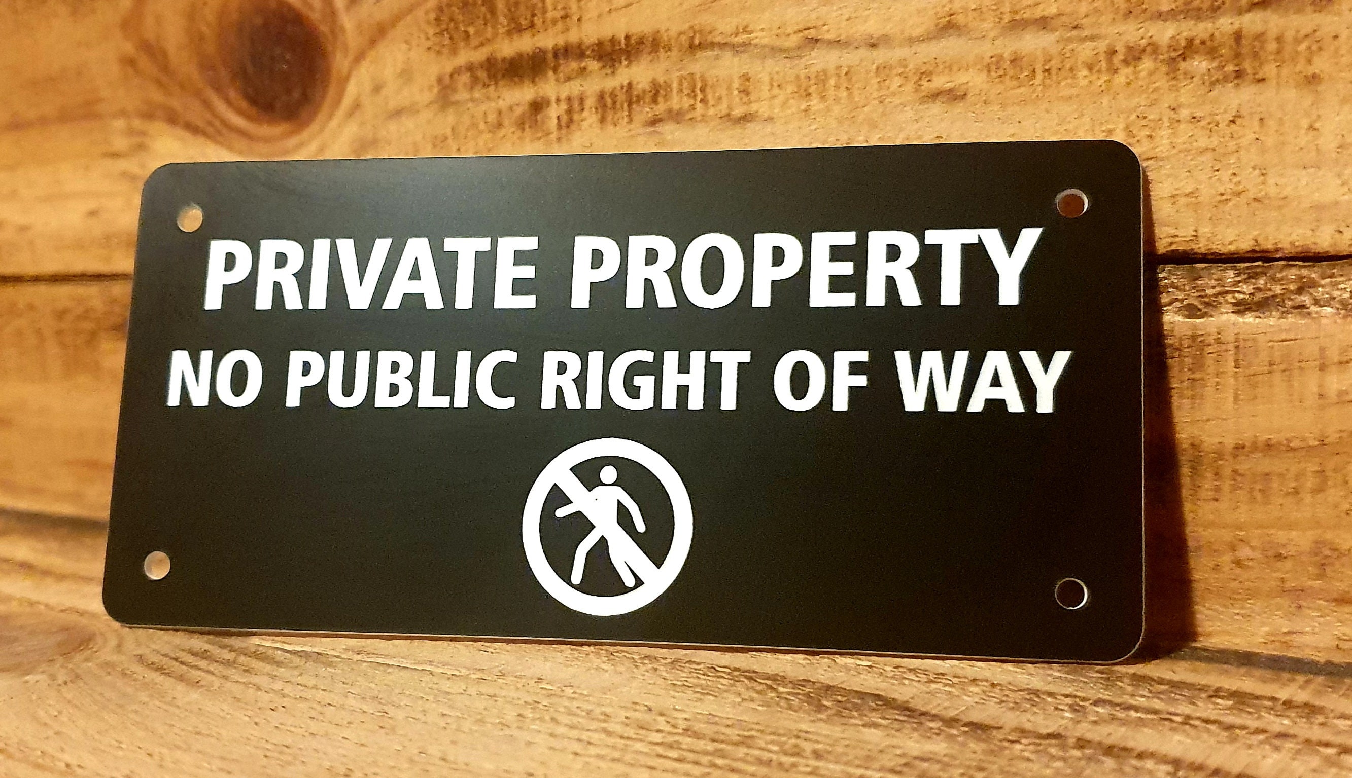 Private property no public right of way sign 