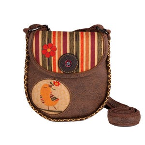 May include: A brown faux leather crossbody bag with a striped fabric flap and a small bird design. The bag has a brown strap and a gold-colored zipper.