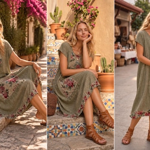 May include: A sage green midi dress featuring short sleeves, a scoop neckline, and a loose silhouette. The garment is accented with floral patterned fabric panels on the chest and a large patch pocket, finished with a matching floral border at the hem.