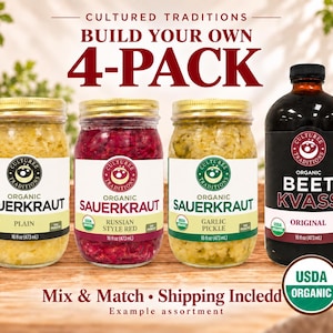 May include: Three glass jars of Cultured Traditions organic sauerkraut in plain, Russian style red, and garlic pickle flavors, alongside one bottle of organic beet kvass. Each container is 16 fl oz and features a USDA Organic label.
