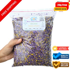 May include: A clear plastic bag filled with dried blue lotus flower petals. The petals are a mix of blue and yellow. The bag is labeled "Blue Lotus Flowers Organic Product of Ceylon".