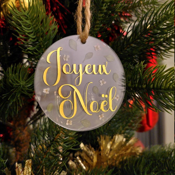 Décoration de sapin "Joyeux noël" avec fleurs pressées